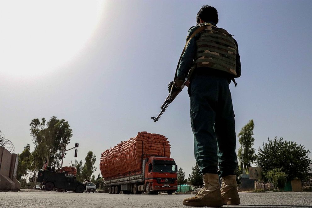 PHOTO: An Afghan security official stands guard at a check point in Kandahar, Afghanistan, Aug. 12 2021. 