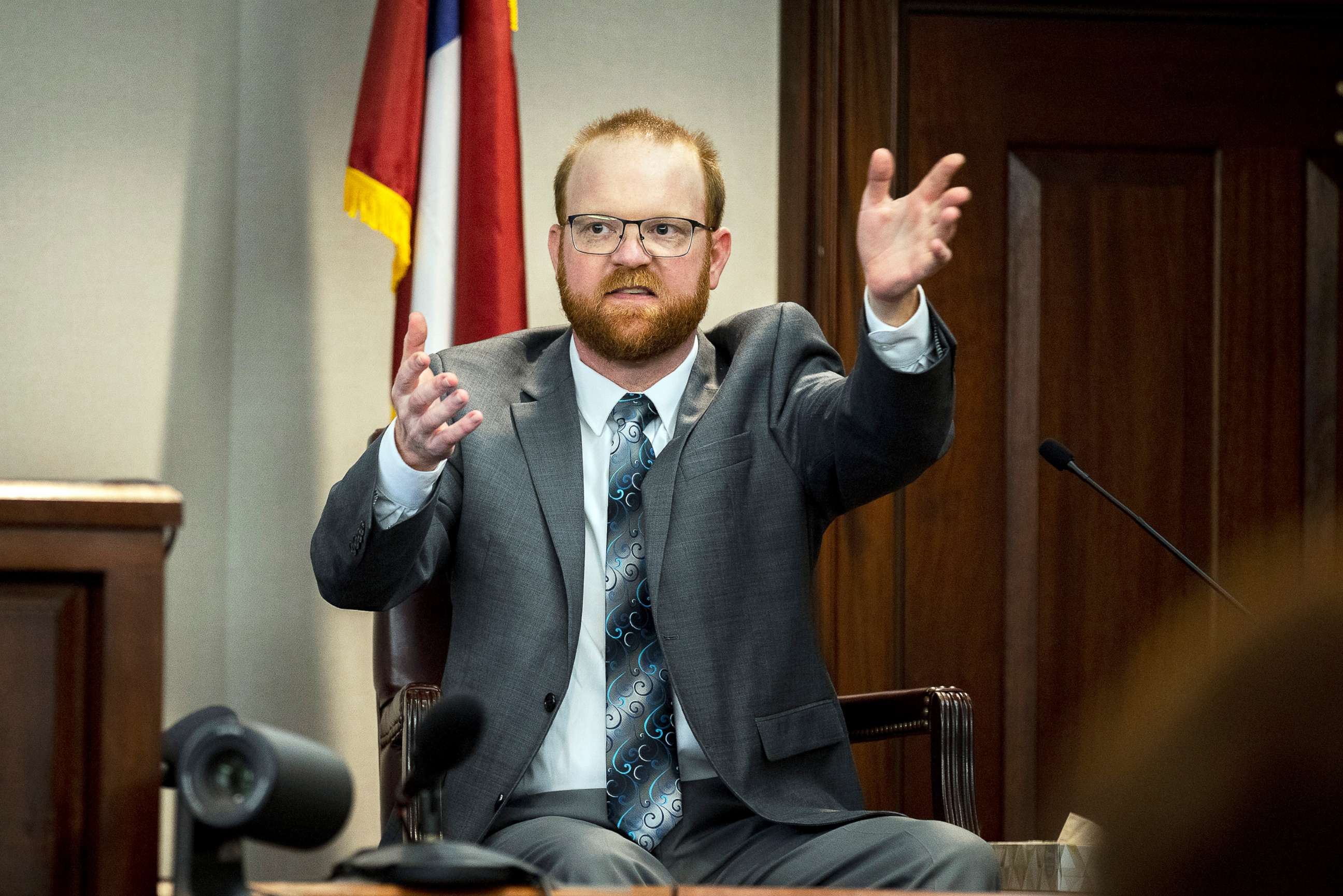 PHOTO: Travis McMichael speaks from the witness stand during his trial in the Glynn County Courthouse in Brunswick, Ga., Nov. 17, 2021.