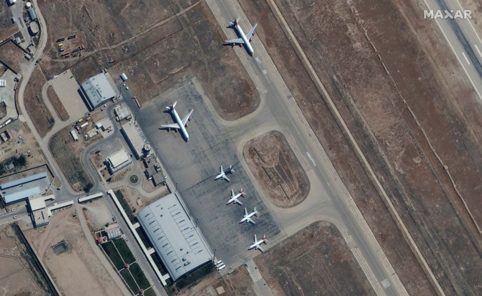 PHOTO: Six commercial airplanes sit grounded near the main terminal of the Mazar-i-Sharif airport, in northern Afghanistan, Sept. 3 2021