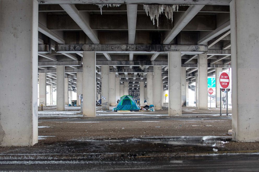 PHOTO: A homeless camp under a bridge on I-35 in Austin, Texas on Feb. 17, 2021.
