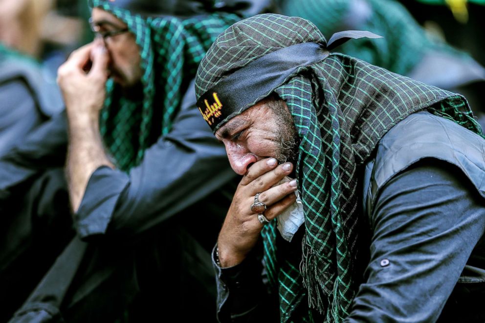 PHOTO: Lebanese Shiite Muslims mourn as they listen to the Al-Hussein biography during the Ashura Day procession in the southern suburb of Beirut, Lebanon, Sept. 20, 2018.
