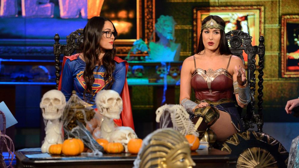 Twin sisters and WWE stars Brie Bella and Nikki Bella joined "The View" on Halloween.