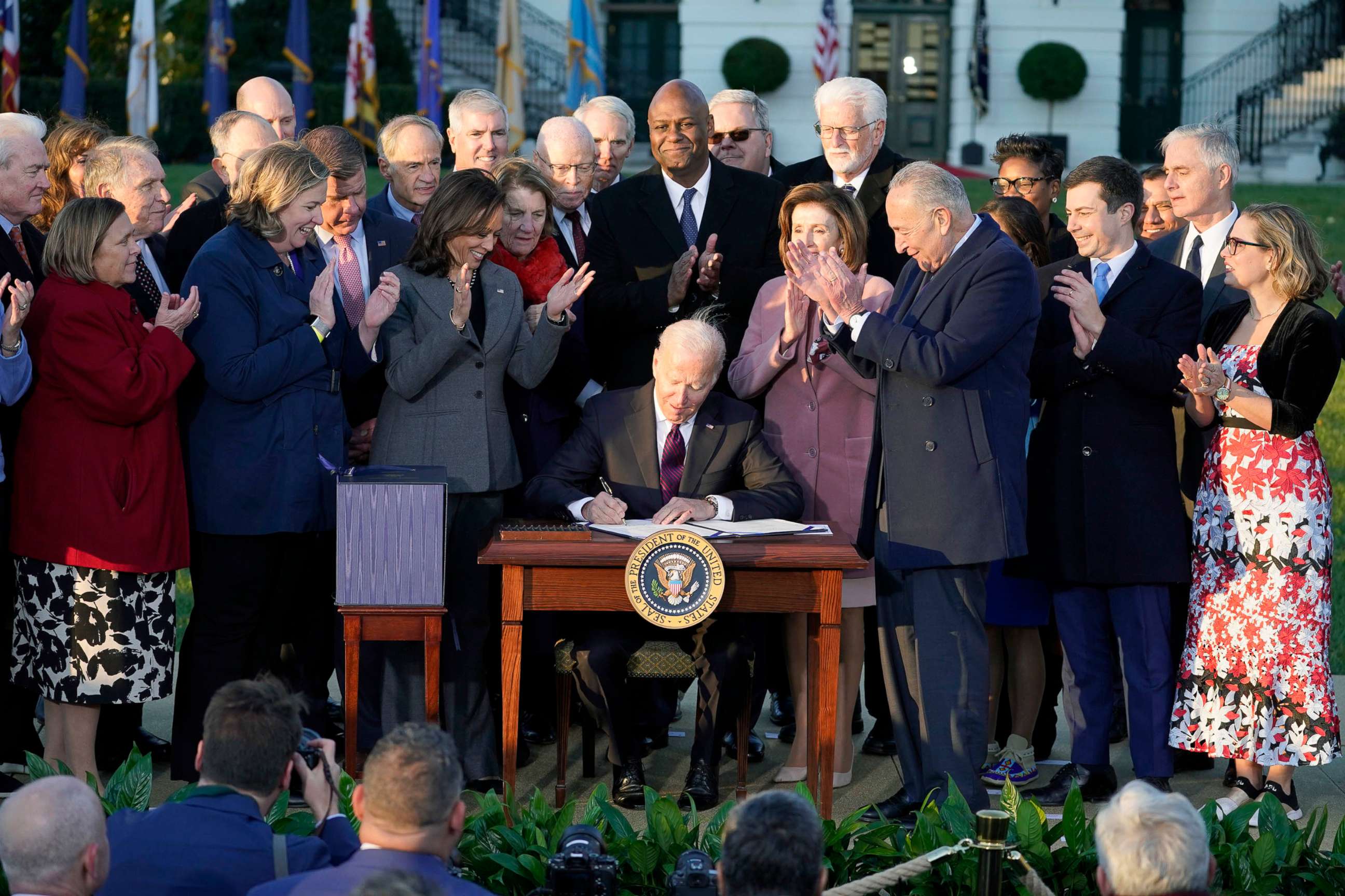 PHOTO: President Joe Biden signs the "Infrastructure Investment and Jobs Act" during an event on the South Lawn of the White House,Nov. 15, 2021.