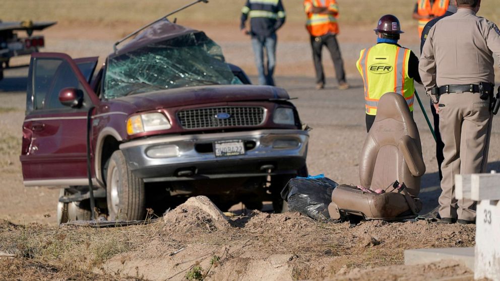 PHOTO: Law enforcement officers sort evidence and debris at the scene of a deadly crash in Holtville, Calif., March 2, 2021.