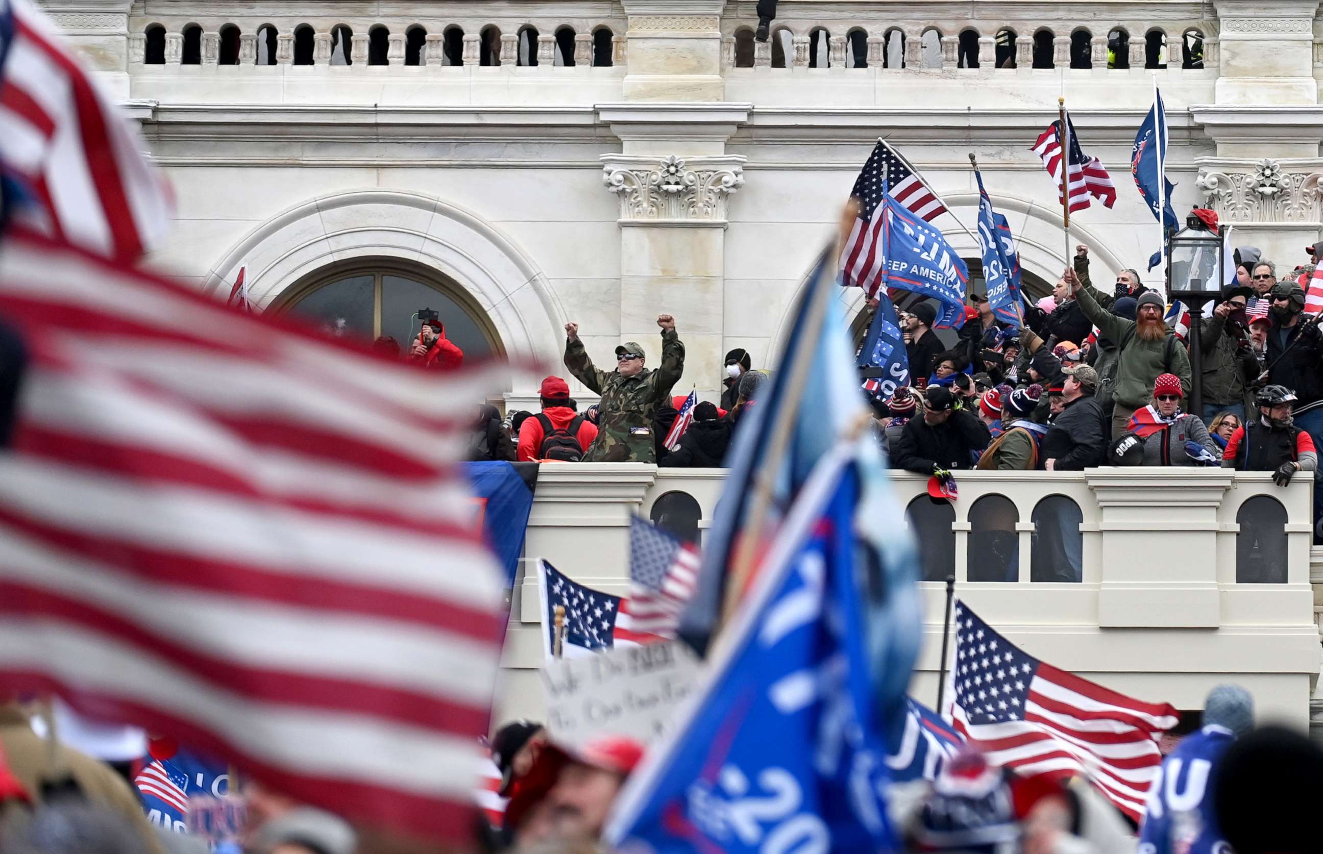 PHOTO: Supporters of President Donald Trump take over balconies and inauguration scaffolding at the United States Capitol on Wednesday Jan. 06, 2021.