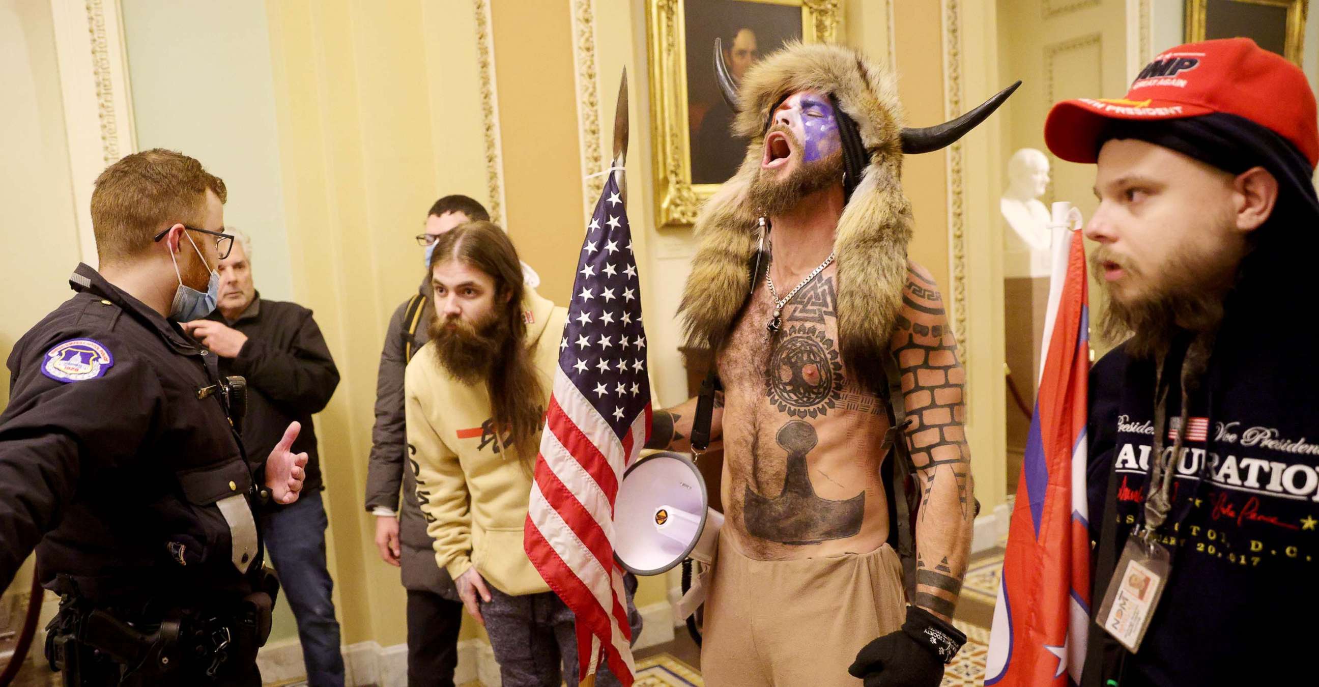 PHOTO: Protesters, including Jacob Anthony Chansley, a.k.a. Jake Angeli, of Arizona, confront Capitol Police after penetrating security at the U.S. Capitol Building on Jan. 06, 2021. 
