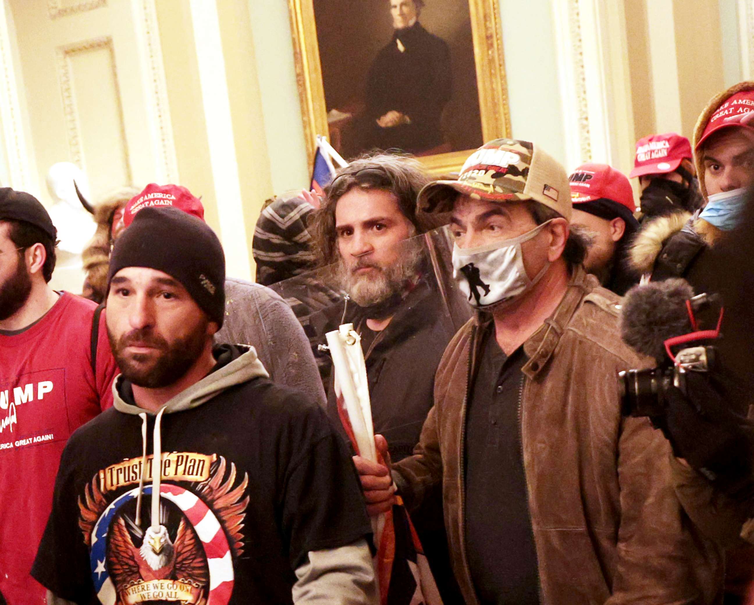 PHOTO: Dominic Pezzola stands among the crowd of supporters of President Donald Trump as they confront Capitol police officers trying to stop them from further entering the Capitol after security was breached in Washington, Jan. 6, 2021.