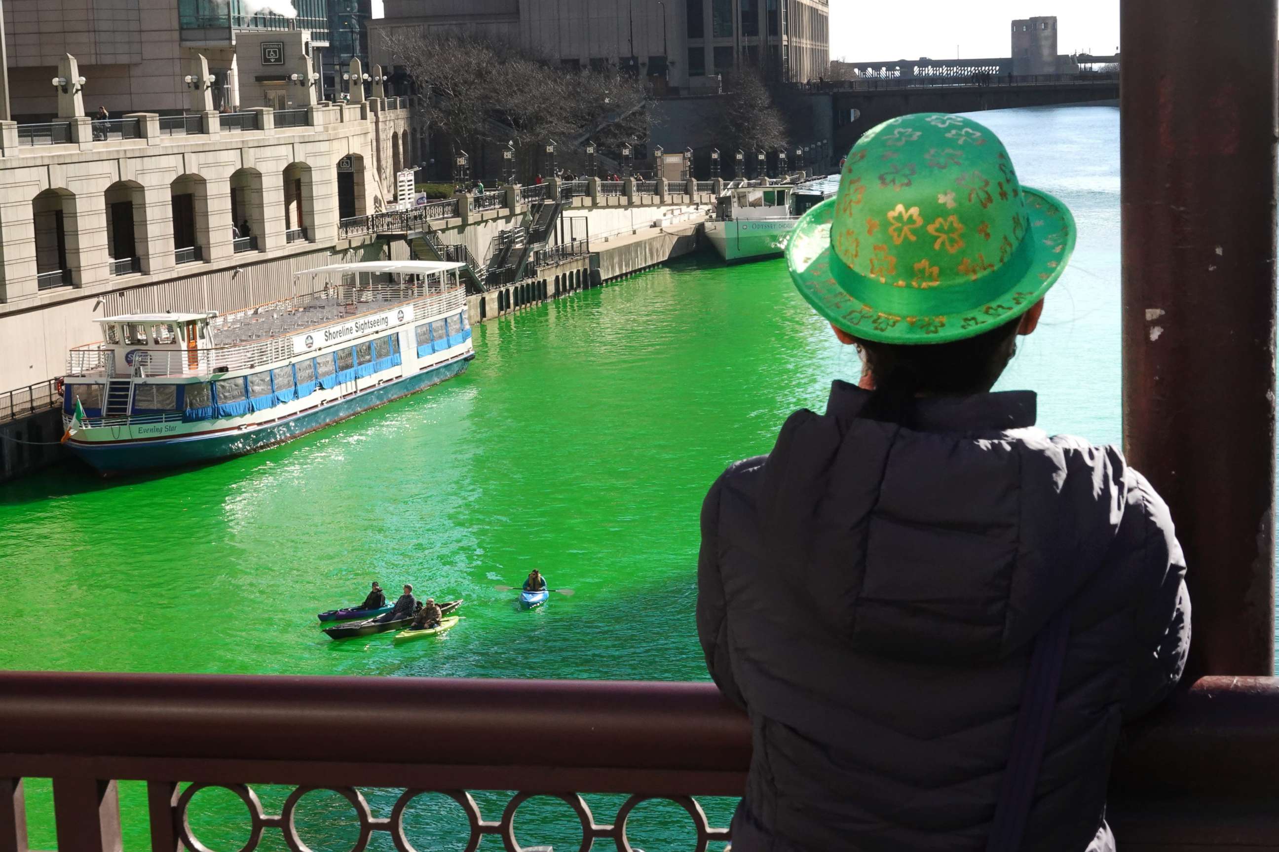 PHOTO: People view the Chicago River after it was dyed green in celebration of St. Patrick's Day on March 13, 2021.