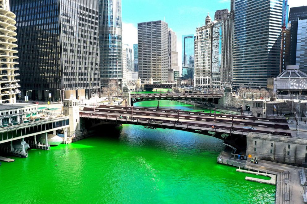 PHOTO: The Chicago River flows through downtown after it was dyed green in celebration of St. Patrick's Day on March 13, 2021 in Chicago.
