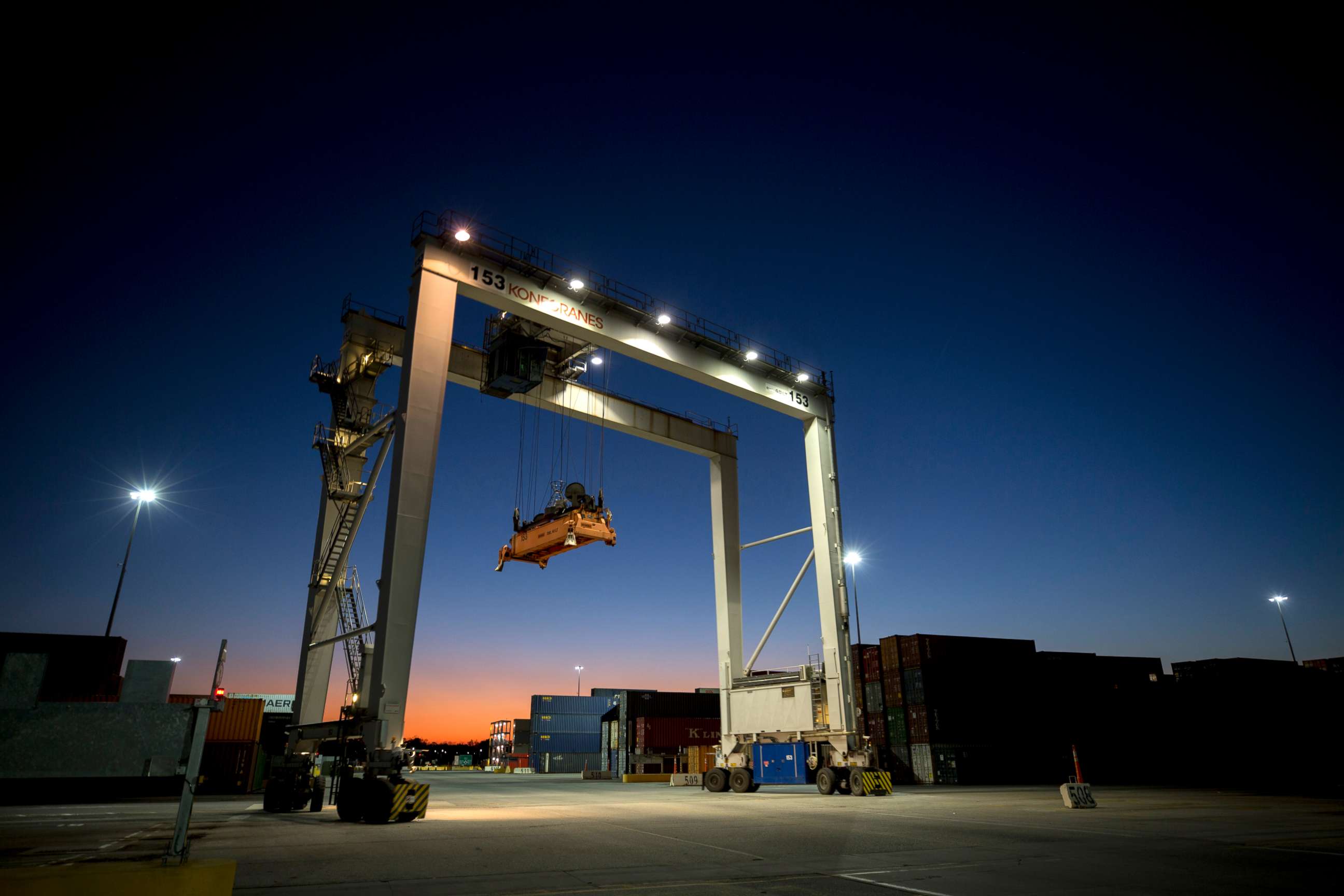 PHOTO: A rubber tire gantry moves into position to transfer shipping containers at the Georgia Ports Authority's Port of Savannah in Savannah, Ga., Jan. 30, 2018.