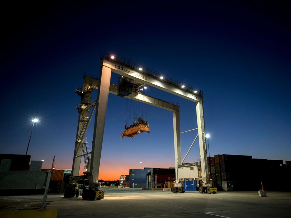 PHOTO: A rubber tire gantry moves into position to transfer shipping containers at the Georgia Ports Authoritys Port of Savannah in Savannah, Ga., Jan. 30, 2018.