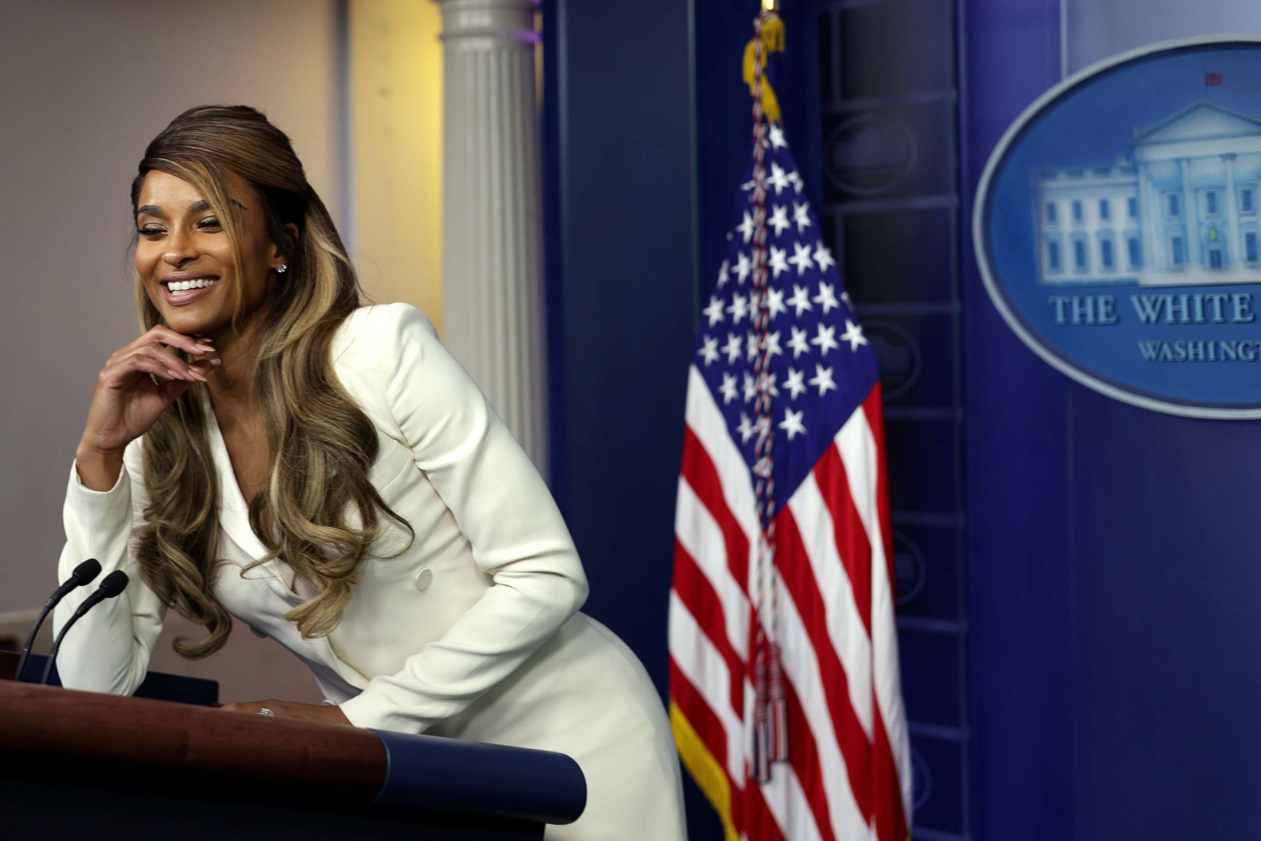 PHOTO:Singer Ciara Princess Wilson poses for photos behind podium during a tour of the James Brady Press Briefing at the White House, Nov. 17, 2021.