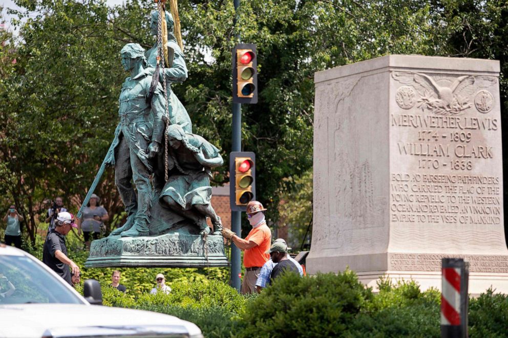 PHOTO: The statue of Meriwether Lewis, William Clark and Sacagawea is removed from Charlottesville, Virginia on July 10, 2021.