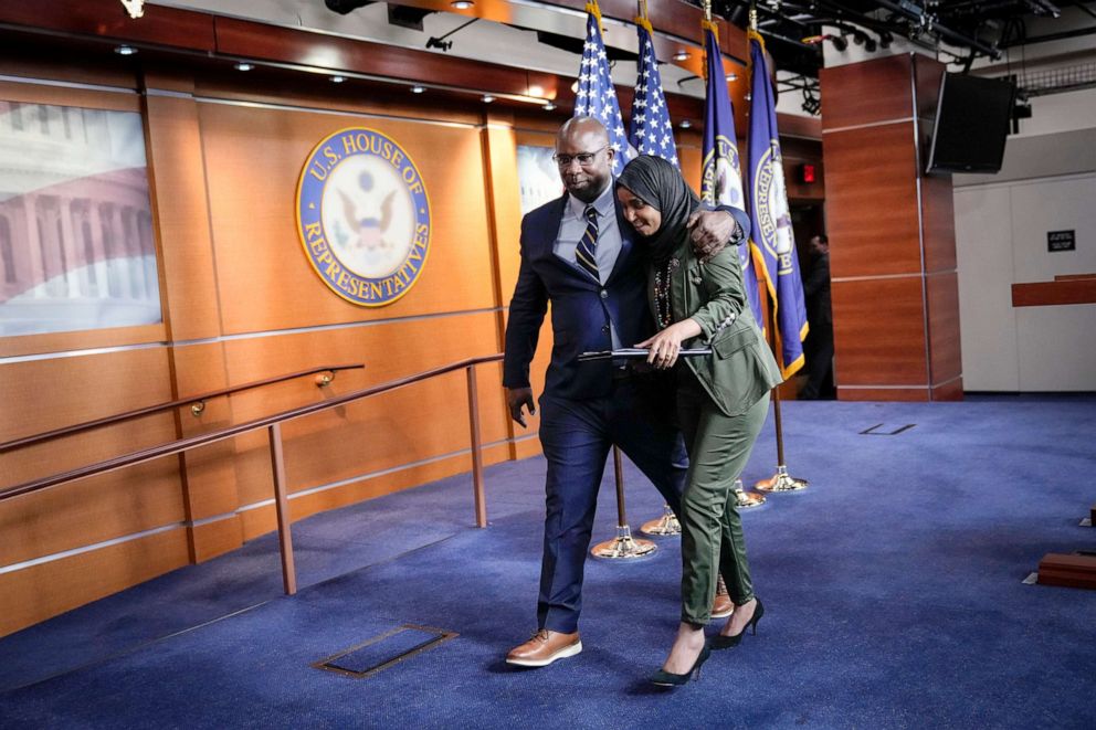 PHOTO: Rep. Jamaal Bowman  embraces Rep. Ilhan Omar as they leave a news conference about Islamophobia on Capitol Hill, Nov. 30, 2021.