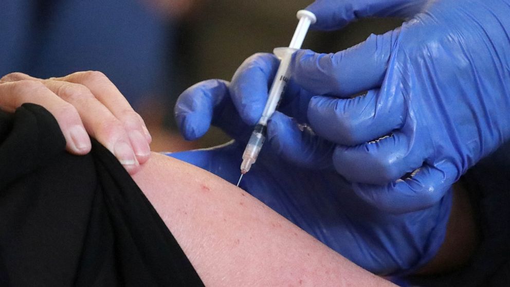 PHOTO: COVID-19 vaccinations and booster shots are administered at the Los Angeles International Airport, Dec. 22, 2021.