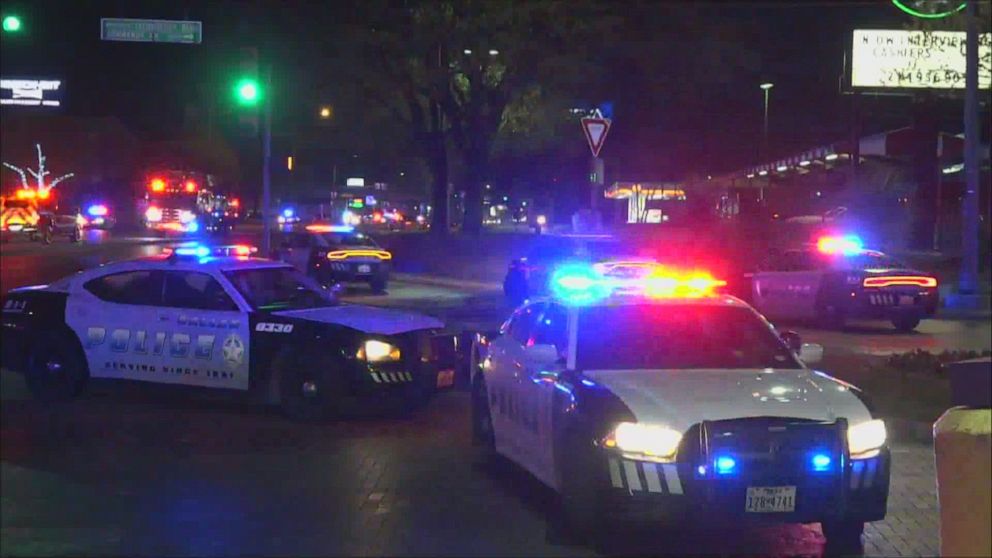 PHOTO: Dallas police vehicles block the road while responding to a shooting left one person dead and multiple others injured in Dallas during the early morning hours of March 20, 2021.