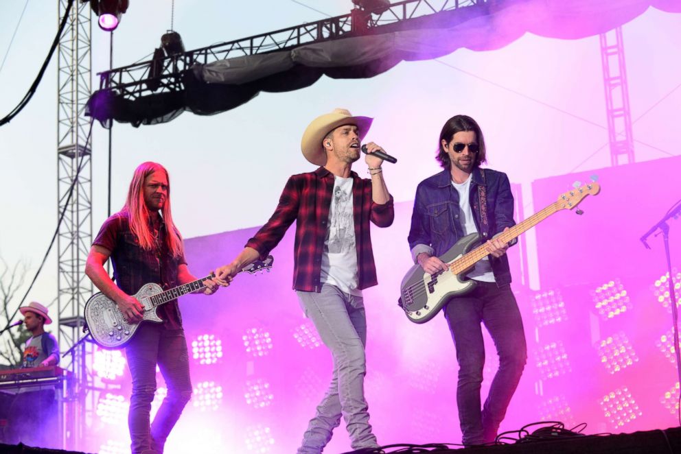 PHOTO: Dustin Lynch, center, performs on stage during the Citadel Country Spirit USA music festival, Aug. 24, 2018, in Glenmoore, Pennsylvania.