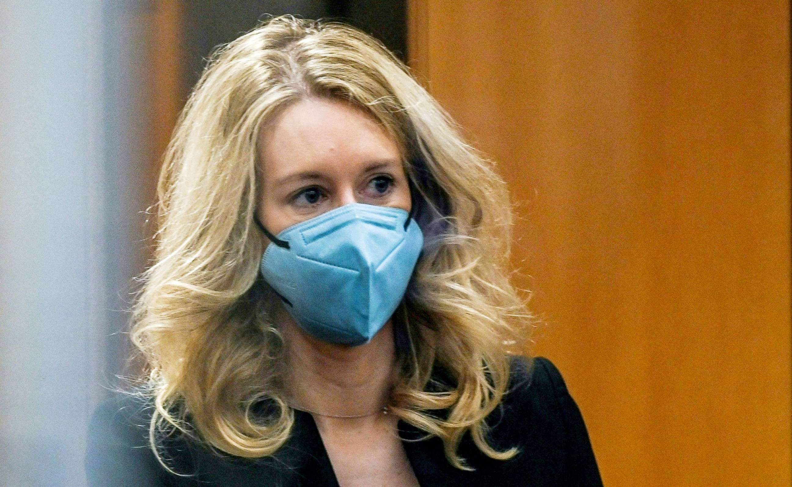 PHOTO: Former Theranos founder and CEO Elizabeth Holmes goes through security after arriving for court at the Robert F. Peckham Federal Building in San Jose, Calif., Nov. 22, 2021.