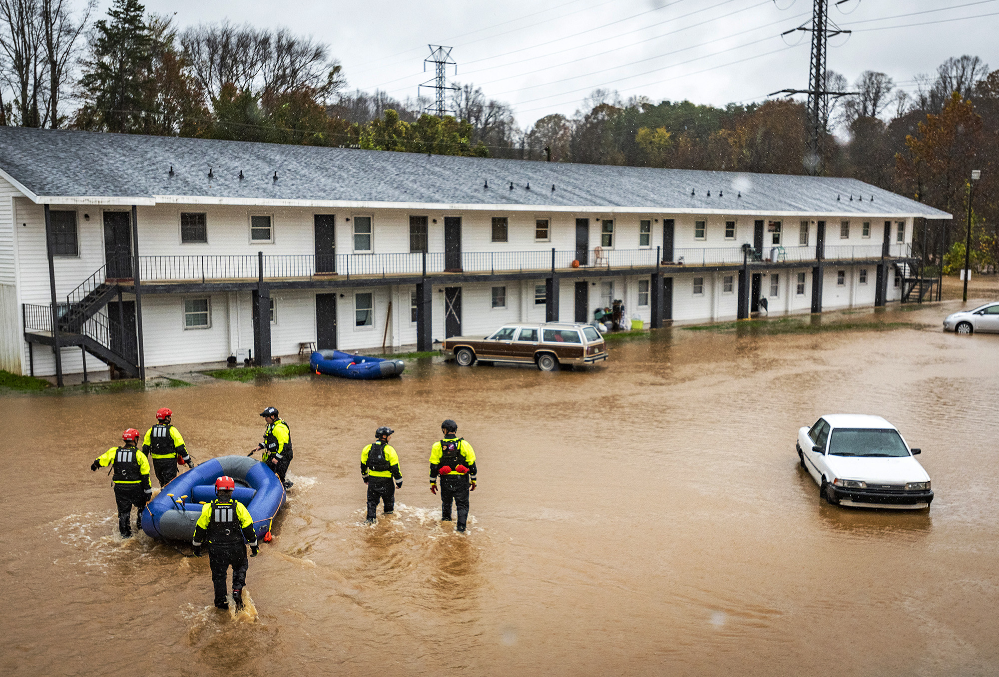 PHOTO: Firefighters with the Winston-Salem Fire Department arrive at Creekwood Apartments to assist with evacuations due to flooding in Winston-Salem, N.C., Nov. 12, 2020.