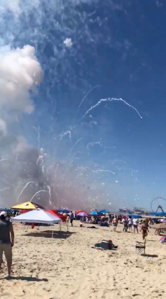 PHOTO: Fireworks prematurely ignite while being set up on the beach for the Town's fireworks show in Ocean City, Fla., July 4, 2021.