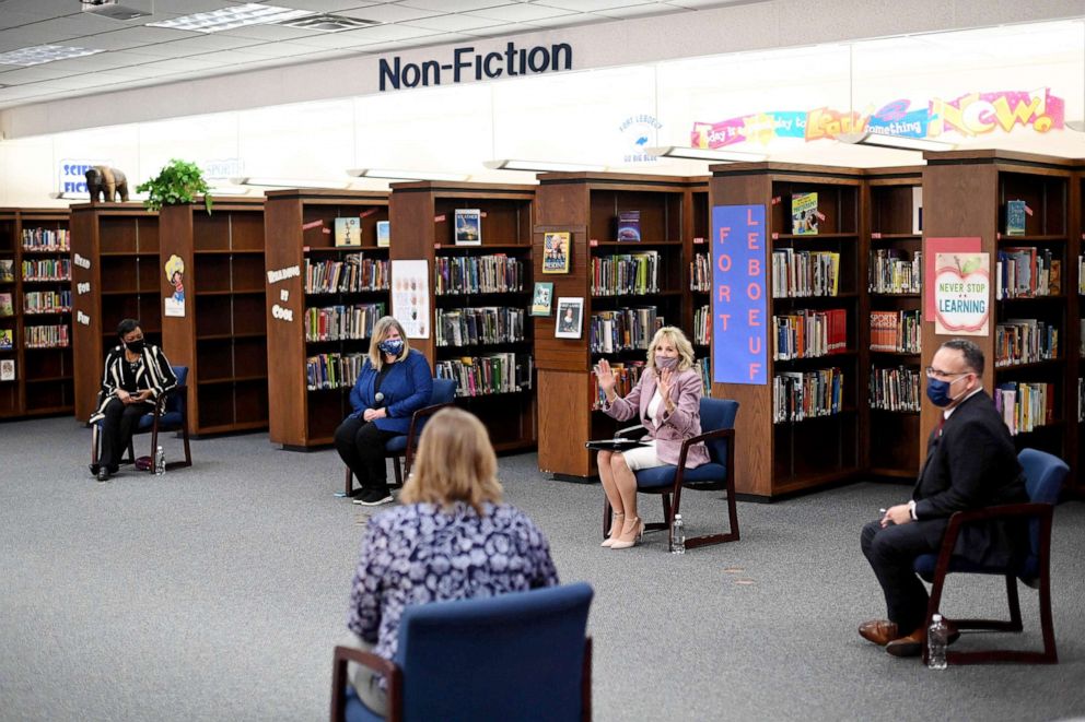 PHOTO: Education Secretary Miguel Cardona speak with parents as they tour Fort LeBoeuf Middle School in Waterford, Pennsylvania, March 3, 2021. 