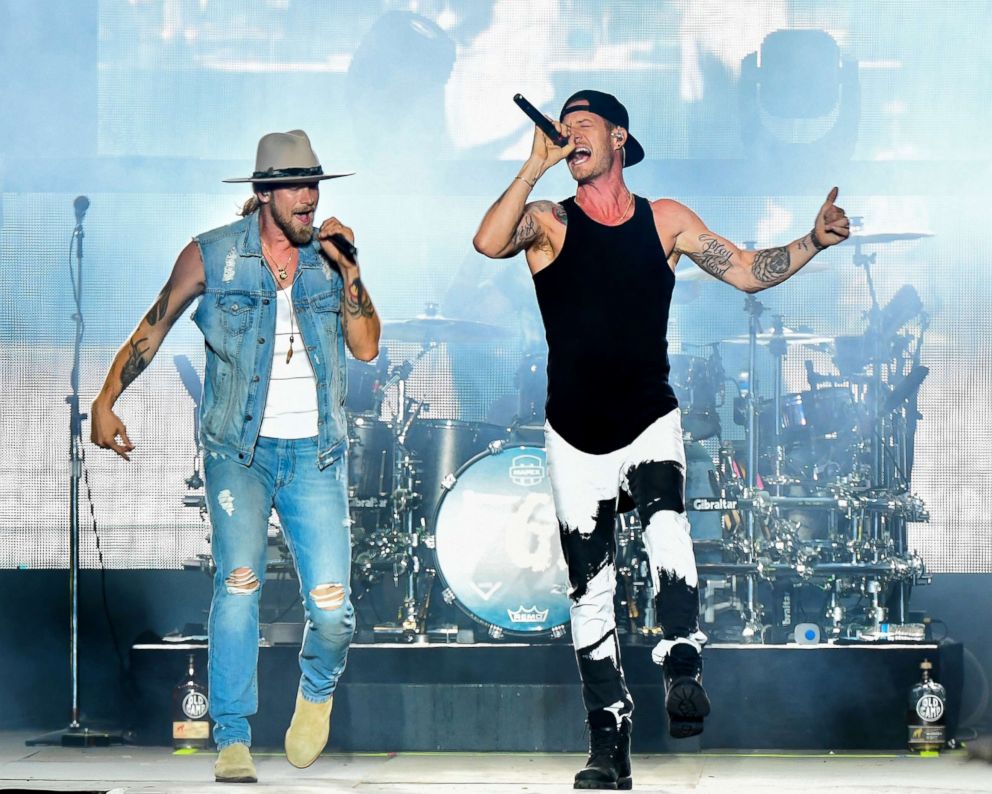 PHOTO: Brian Kelley and Tyler Hubbard of Florida Georgia Line perform at Michigan International Speedway, July 22, 2018, in Brooklyn, Michigan.