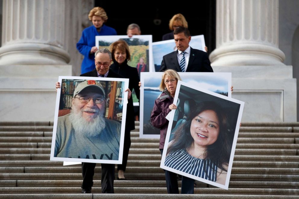 PHOTO: Senate Minority Leader Chuck Schumer, Senate Assistant Democratic Leader Patty Murray and Senate democrats carry photographs of furloughed federal workers during a press conference outside the US Capitol, Jan. 16, 2019.