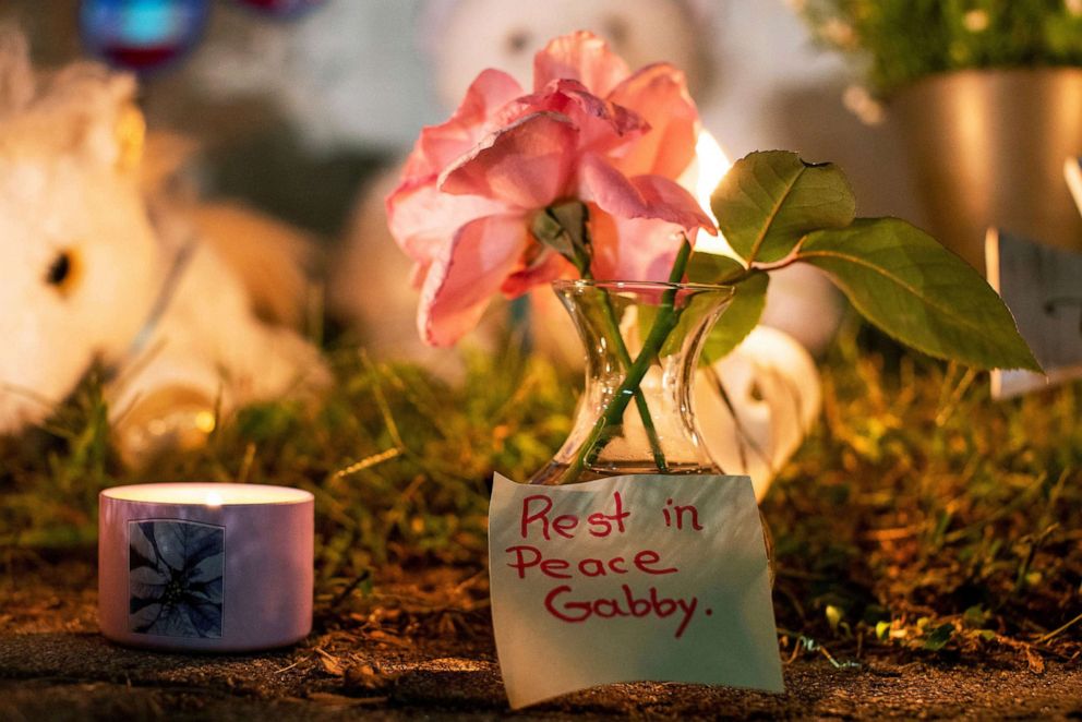 PHOTO: A note saying "Rest in Peace Gabby" sits in a makeshift memorial during a candlelight vigil for travel blogger Gabby Petito in Blue Point, N.Y., Sept. 24, 2021. 