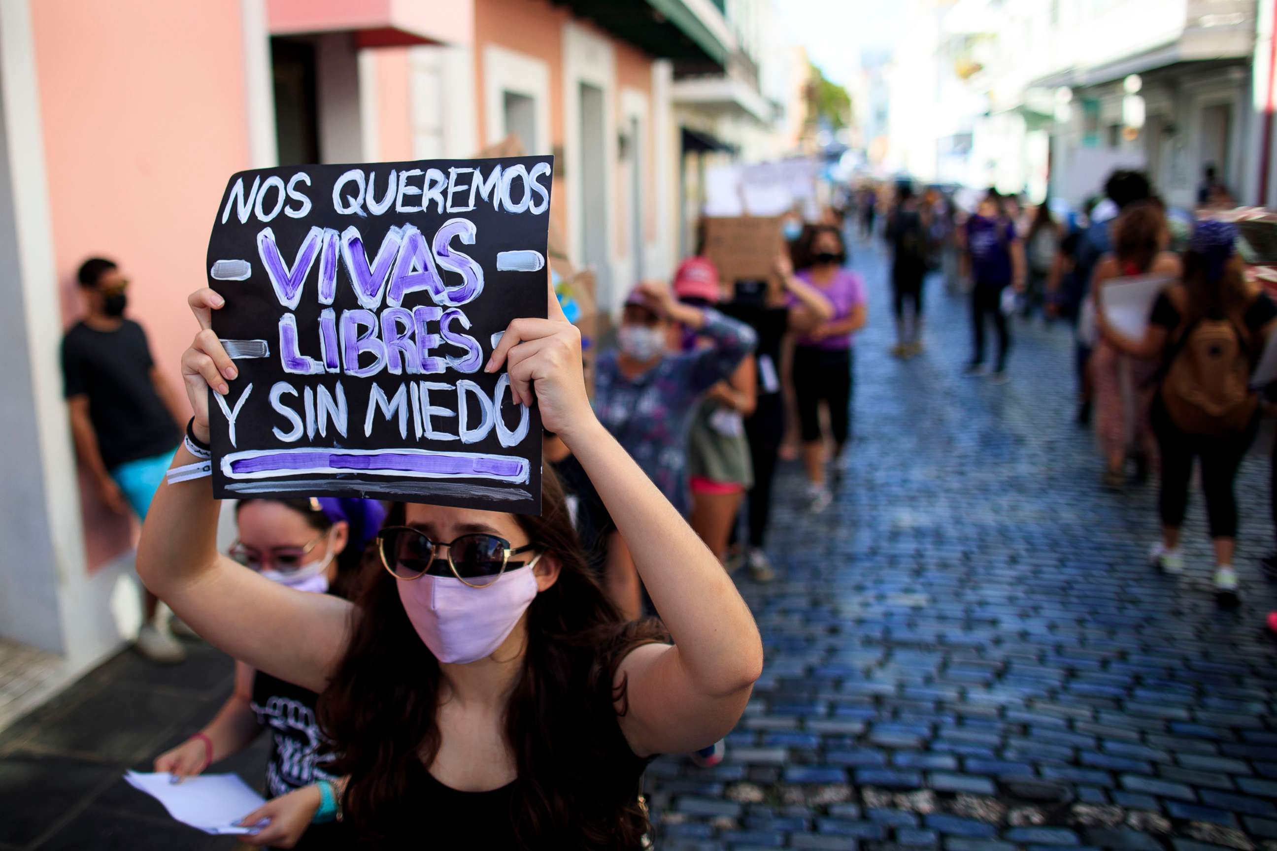 PHOTO: Demonstrators march in protest of gender violence against women in San Juan, Puerto Rico, May 3, 2021.
