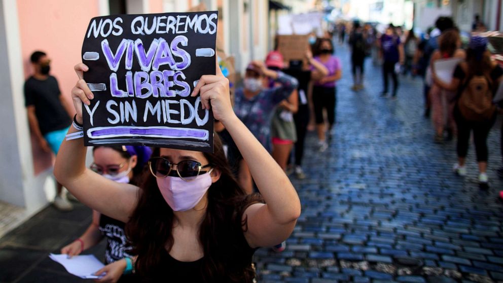 PHOTO: Demonstrators march in protest of gender violence against women in San Juan, Puerto Rico, May 3, 2021.