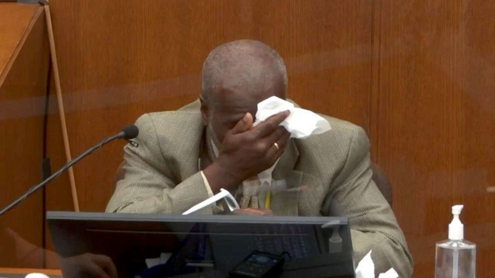 PHOTO: Witness Charles McMillian wipes his face while testifying during the second day of the trial of former Minneapolis police officer Derek Chauvin in Minneapolis, March 30, 2021