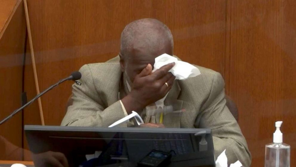 PHOTO: Witness Charles McMillian wipes his face while testifying during the second day of the trial of former Minneapolis police officer Derek Chauvin in Minneapolis, March 30, 2021