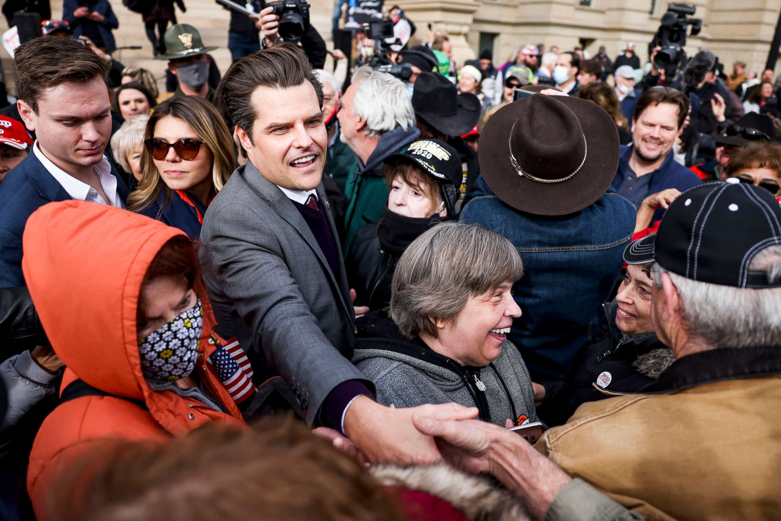 PHOTO: Rep. Matt Gaetz greets supporters after speaking to a crowd during a rally against Rep. Liz Cheney in Cheyenne, Wyo, Jan. 28, 2021.