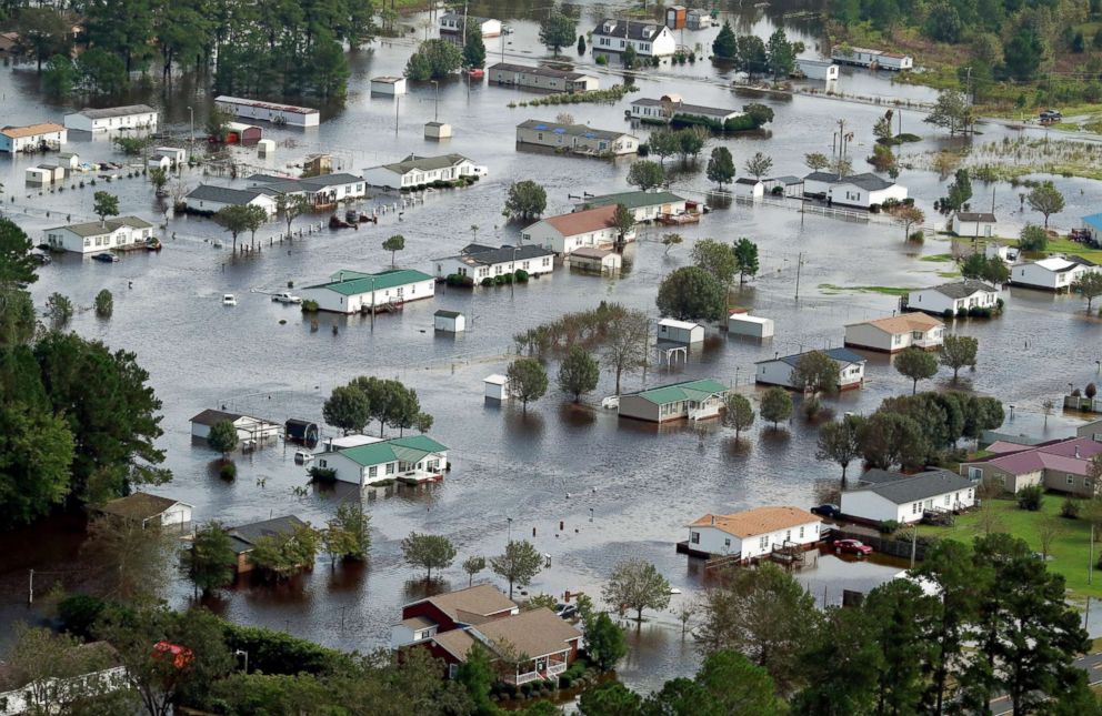 PHOTO: Houses sit in floodwater caused by Hurricane Florence, in this aerial picture, on the outskirts of Lumberton, North Carolina, Sept. 17, 2018.