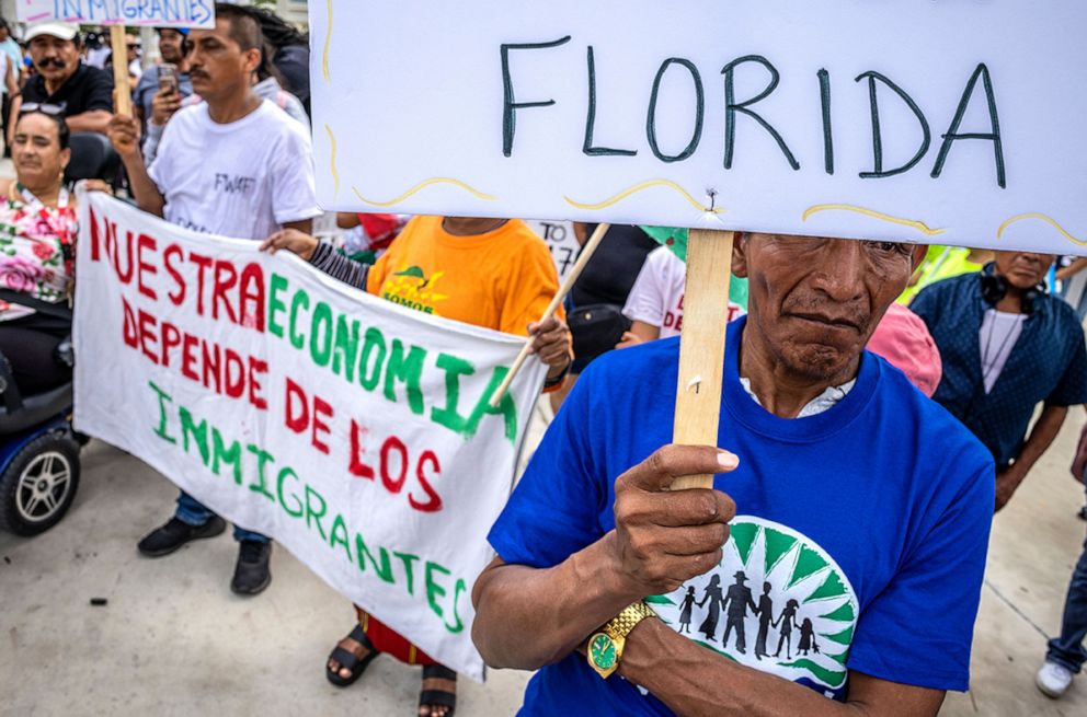 PHOTO: Members of the South Florida immigrant community demonstrate against Florida's immigration law SB1718, in Homestead, Fla., July 1, 2023.