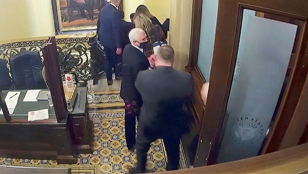 PHOTO: Security video shows Vice President Mike Pence being evacuated from the Senate chamber, as House impeachment manager Rep. Eric Swalwell speaks during the second impeachment trial of former President Donald Trump in the Senate, Feb. 10, 2021.