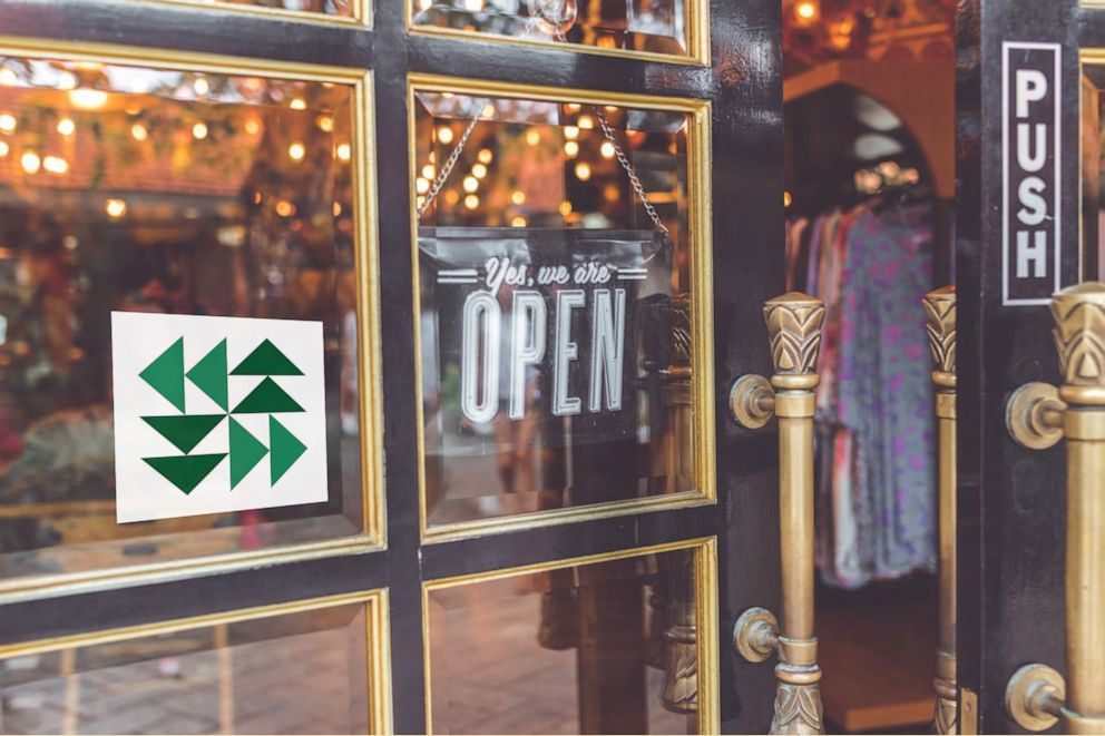 PHOTO: Digital Green Book founders Crystal Egli and Parker McMullen Bushman say their quilt pattern logo can be displayed by businesses to signal a safe and inviting space for people of color and LGBTQ communities.