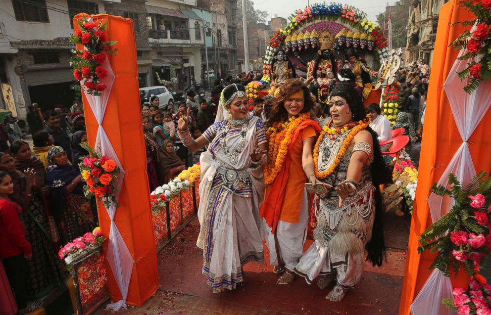PHOTO: Artists perform with a member of Kinnar Akhara for transgenders, during a religious procession at the confluence of rivers Ganges, Yamuna and mythical Saraswati, as part of Kumbh festival in Allahabad, India, Jan. 6, 2019.