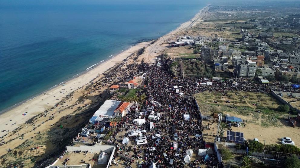PHOTO: An aerial photograph taken by a drone shows displaced Palestinians gathering with their belongings near a roadblock on the al Rashid Street, as they wait to return to their homes in the northern part of the Gaza Strip, Jan. 26, 2025.