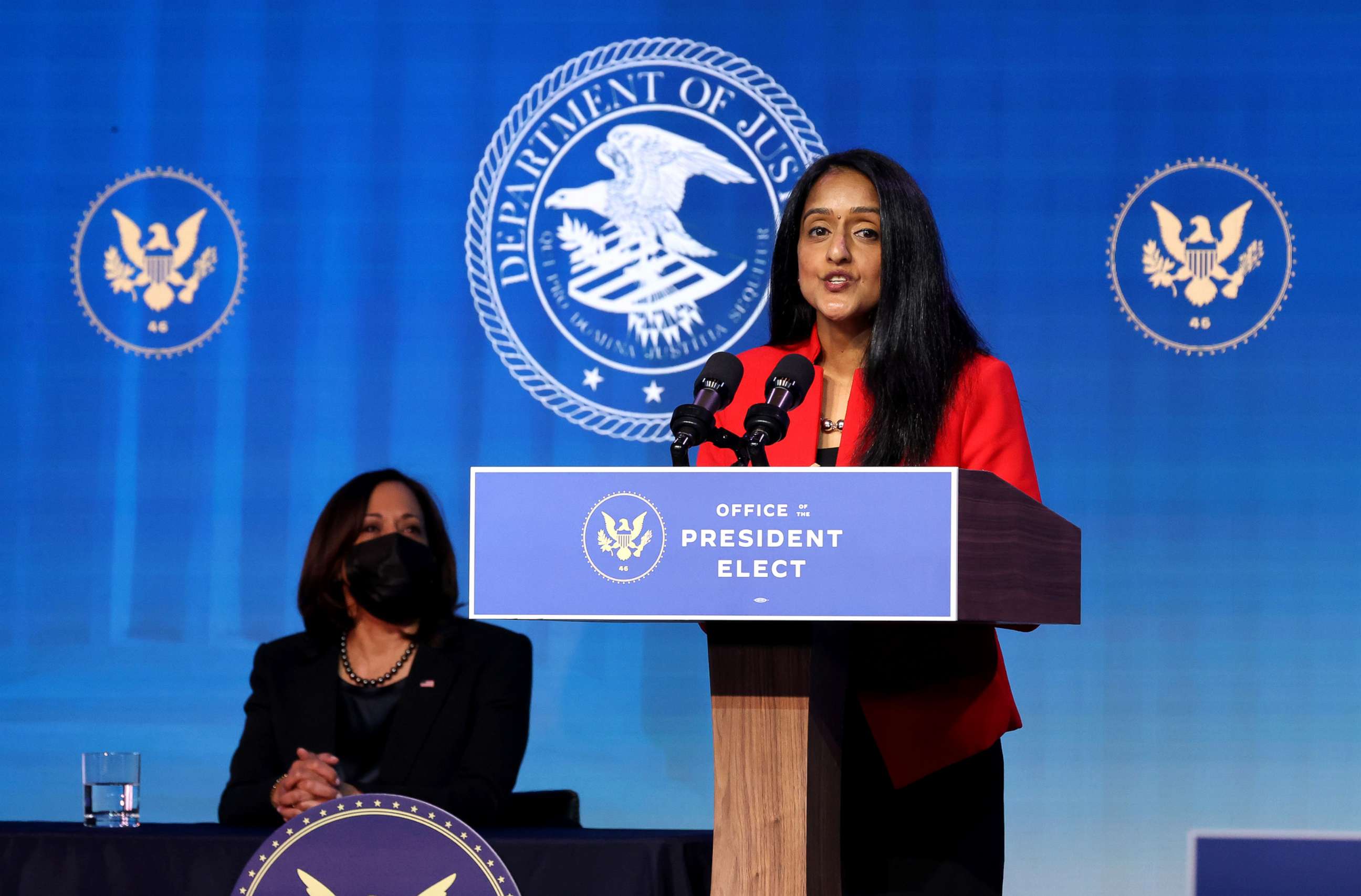 PHOTO:  Vice President-elect Kamala Harris looks on as Vanita Gupta delivers remarks after being nominated to be U.S. associate attorney general by President-elect Joe Biden in Wilmington, Del., Jan. 7, 2021.