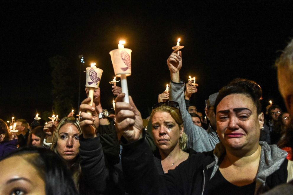 PHOTO: Mourners attend a candlelight vigil for the victims of the fatal limousine crash, Oct. 8, 2018, in Amsterdam, New York.