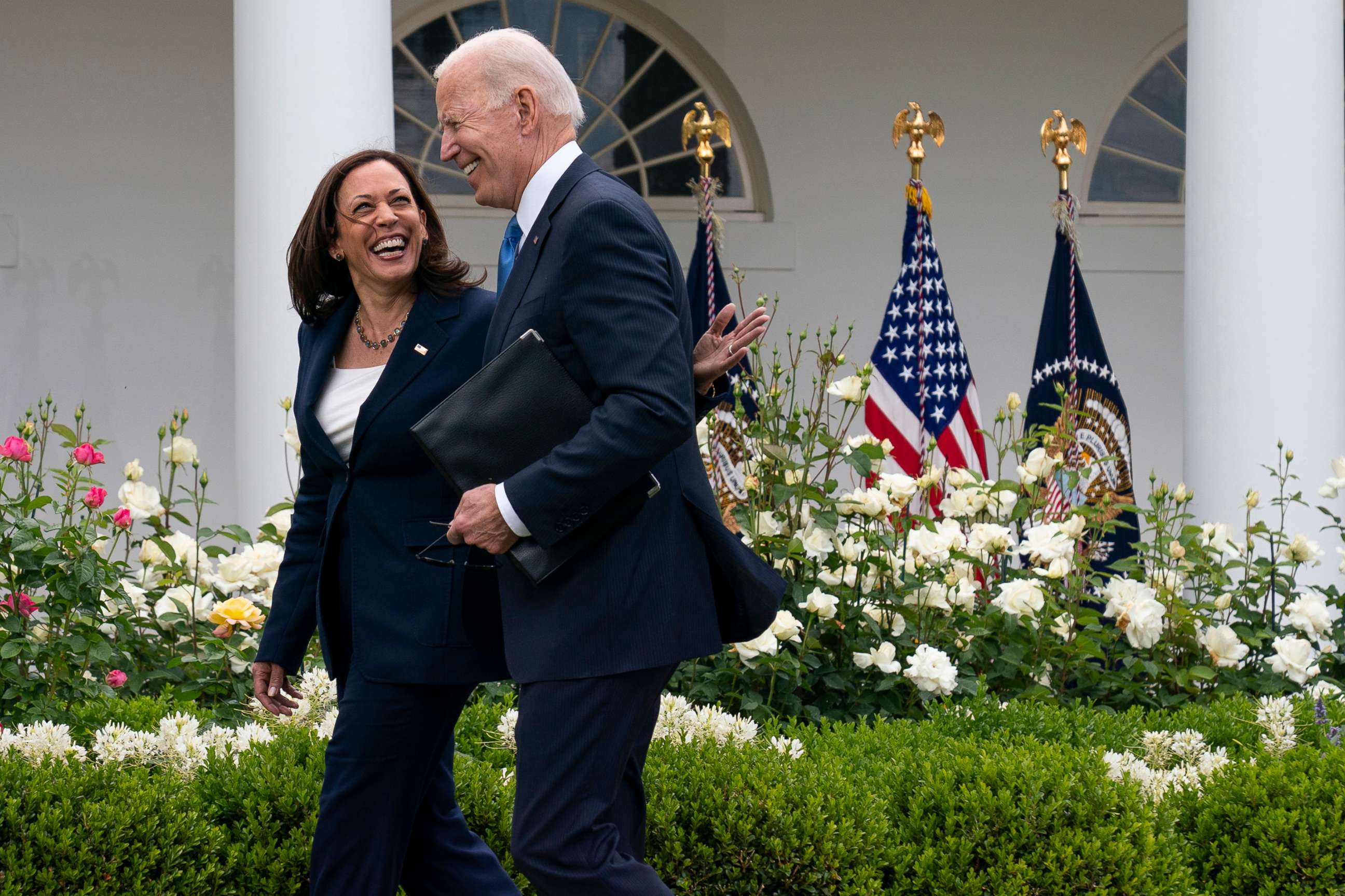PHOTO: Vice President Kamala Harris and President Joe Biden smile and walk off after speaking about updated guidance on mask mandates, in the Rose Garden of the White House, May 13, 2021.