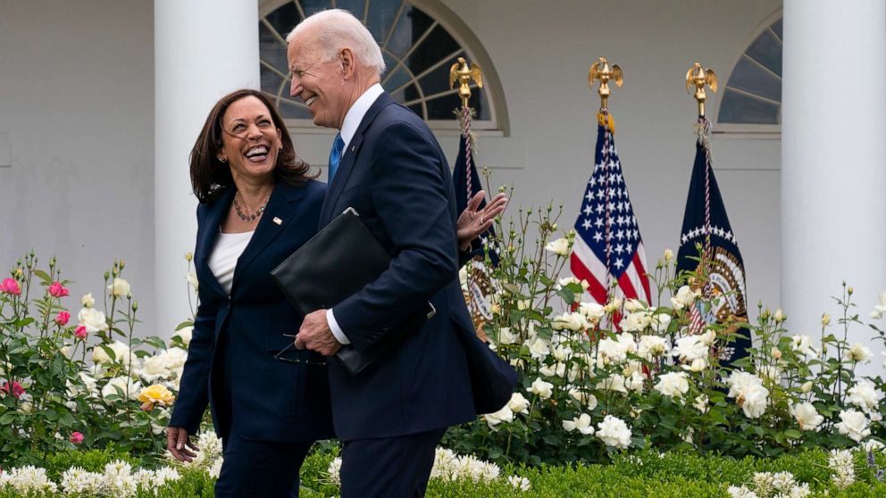 PHOTO: Vice President Kamala Harris and President Joe Biden smile and walk off after speaking about updated guidance on mask mandates, in the Rose Garden of the White House, May 13, 2021.