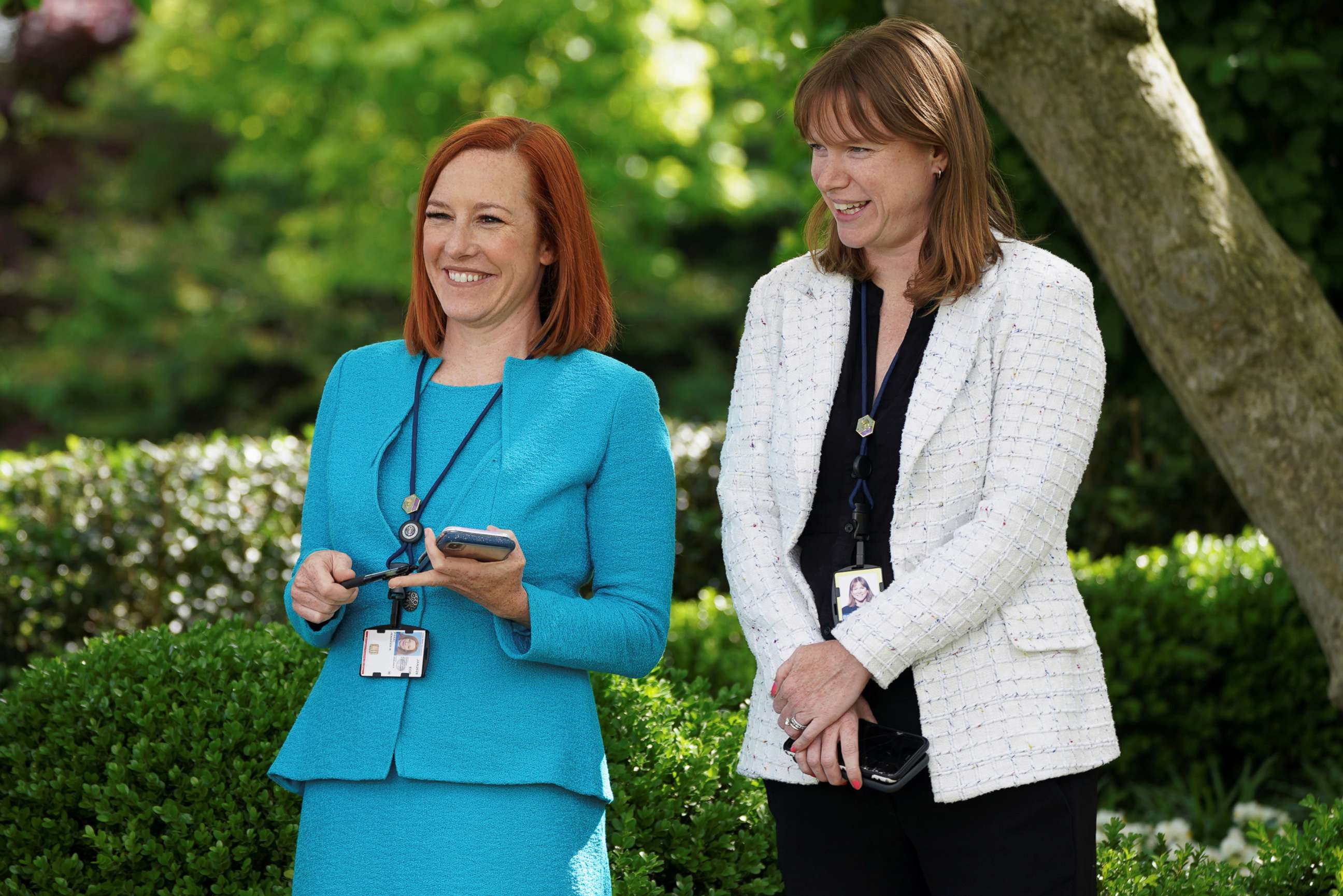 PHOTO:White House Press Secretary Jen Psaki and Communications Director Katherine Bedingfield laugh without protective face masks at the Rose Garden of the White House in Washington, May 13, 2021. 