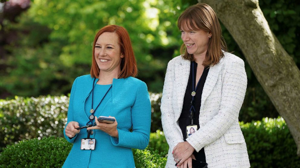 PHOTO:White House Press Secretary Jen Psaki and Communications Director Katherine Bedingfield laugh without protective face masks at the Rose Garden of the White House in Washington, May 13, 2021. 