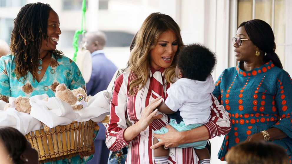 PHOTO: First lady Melania Trump holds a baby as she visits Greater Accra Regional Hospital in Accra, Ghana, Oct. 2, 2018.