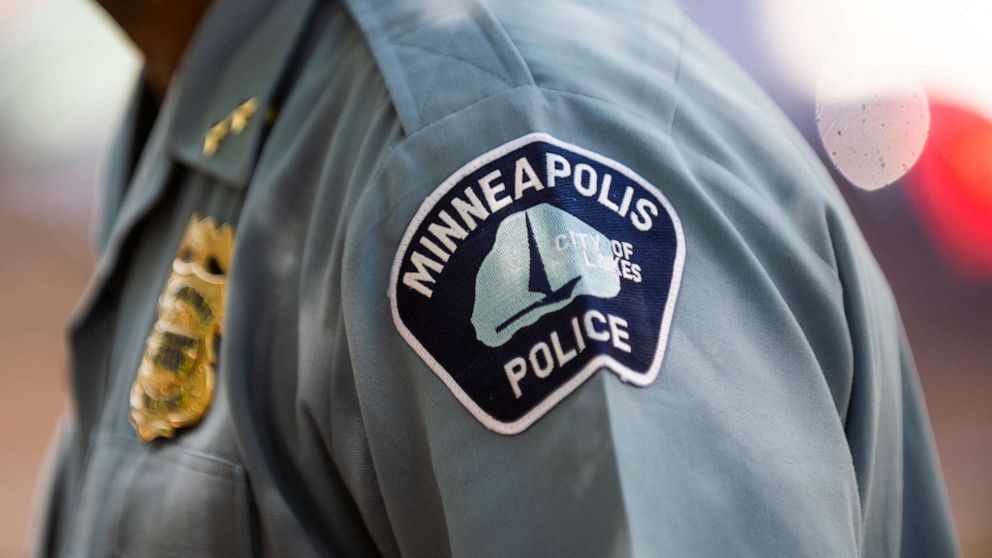 PHOTO: Minneapolis Police Deputy Chief Art Knight speaks with people gathered near a crime scene on June 16, 2020 in Minneapolis, Minnesota.