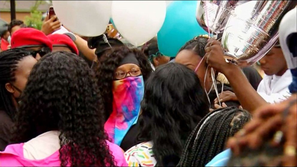 PHOTO: Family and members of the community gather for a vigil after the death of 6-year old Aniya Allen in Minneapolis, May 19, 2021.