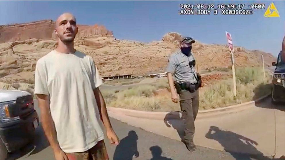PHOTO: This police camera video provided by The Moab Police Department shows Brian Laundrie talking to a police officer after police pulled over the van he was traveling in near the entrance to Arches National Park on Aug. 12, 2021