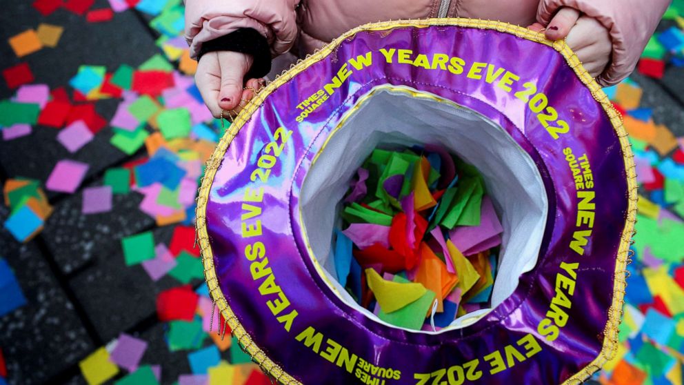 PHOTO: Jessica Martini, 7, holds a hat with pieces of confetti in it, as New Year's Eve confetti is 'flight-tested' ahead of celebrations in Times Square, New York City, Dec. 29, 2021.
